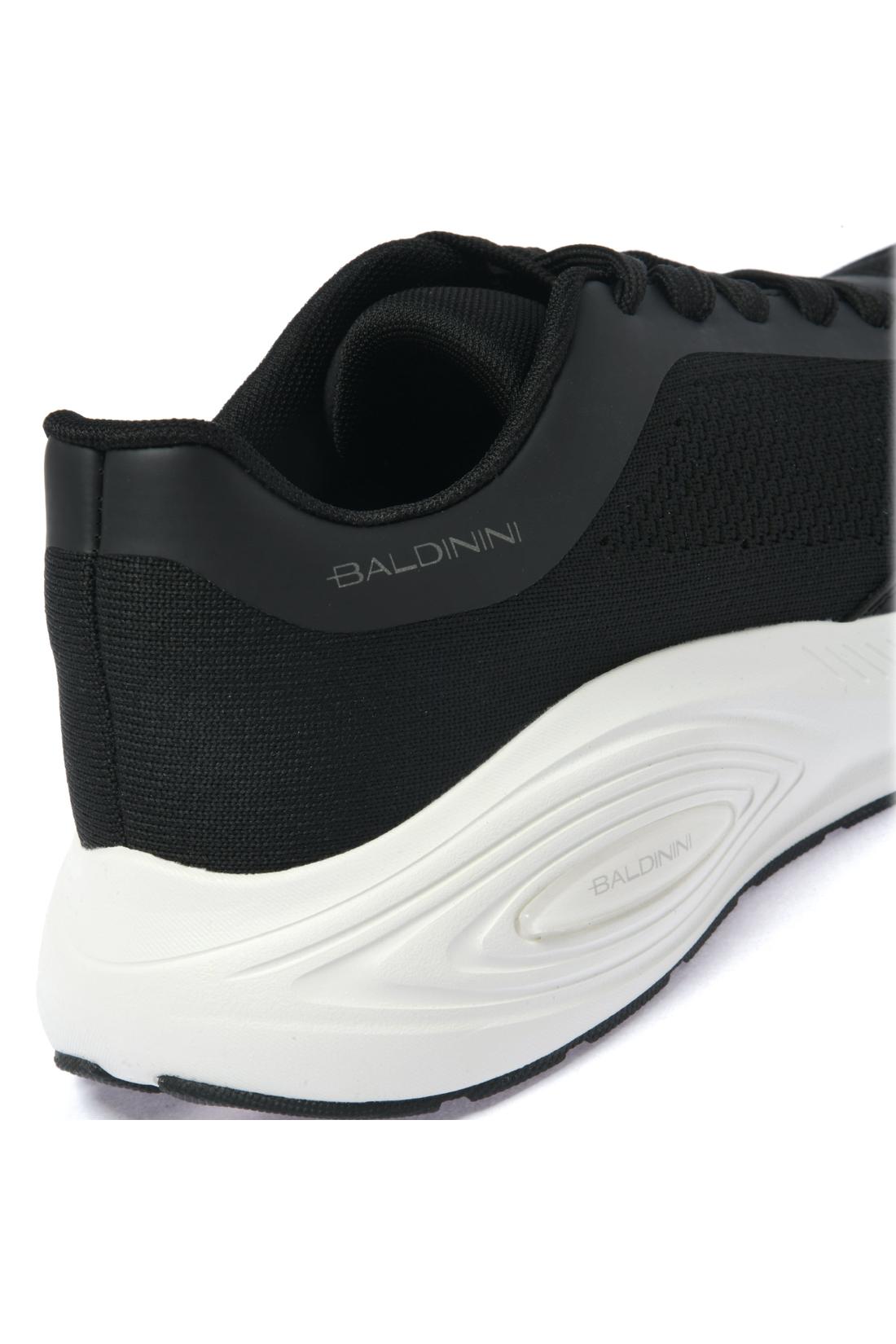Sneaker in leather and black fabric